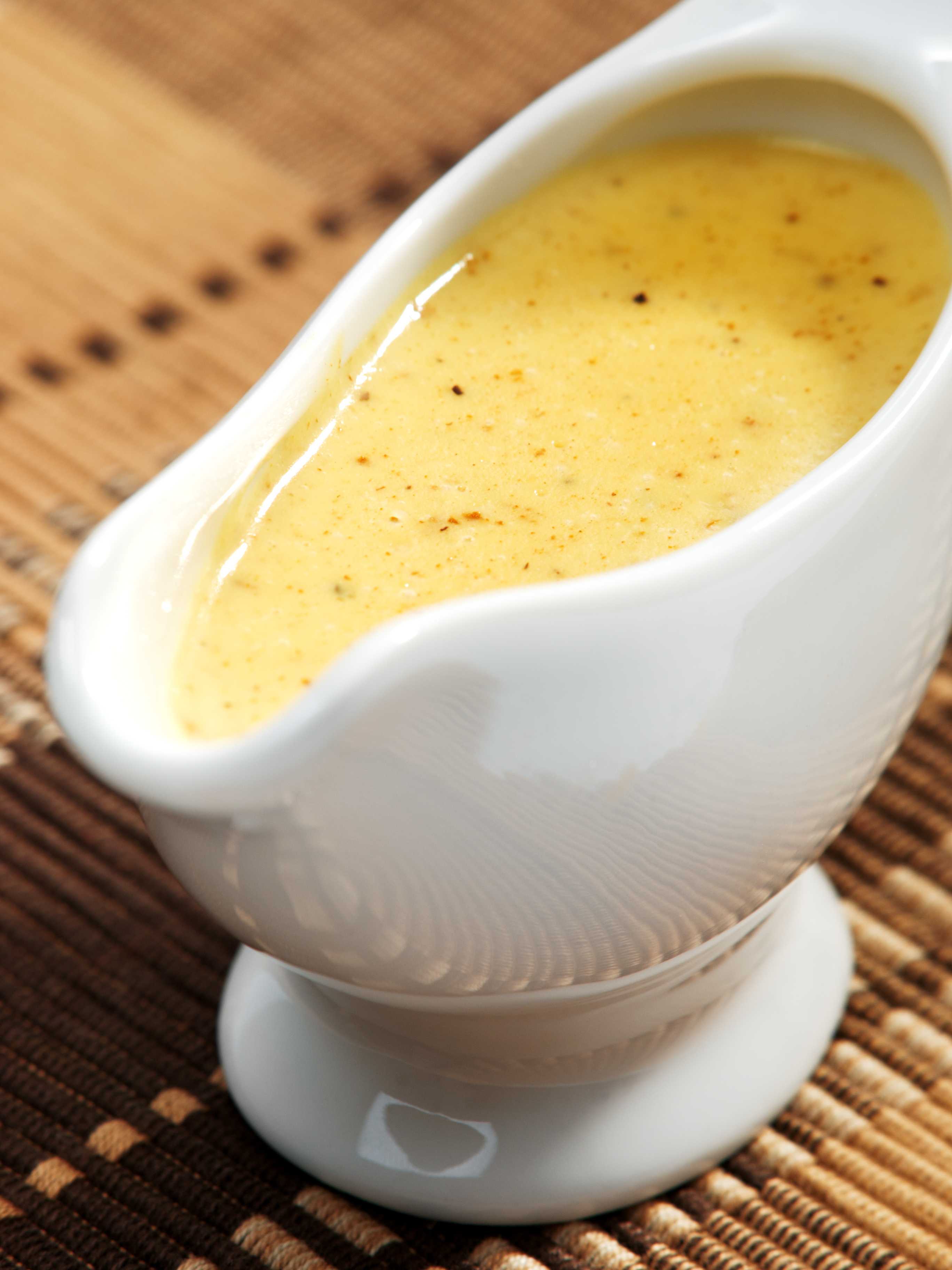 Foto: Shutterstock Ivan Mateev Bild på såskanna med gul currysås