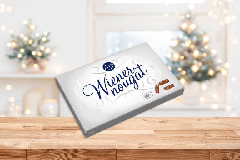 En ask nougat mot en julig bakgrund