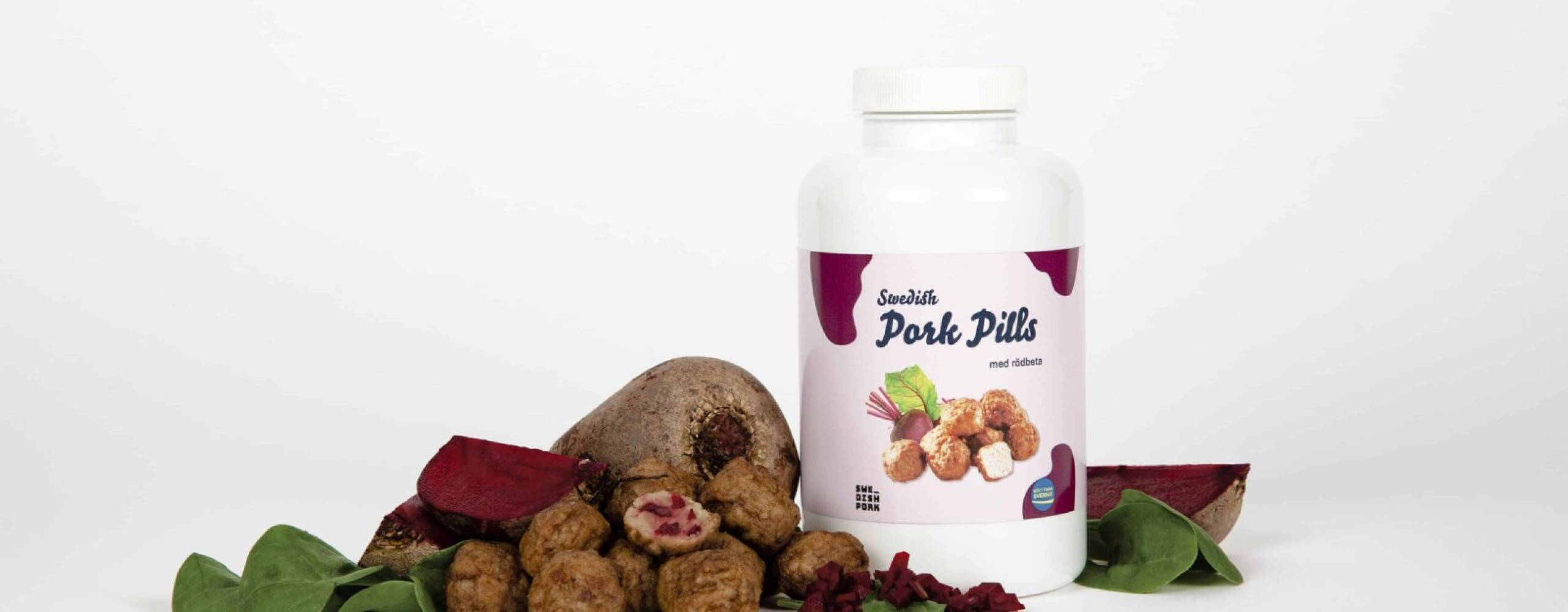 Köttbullar som kosttillskott mot en vit bakgrund